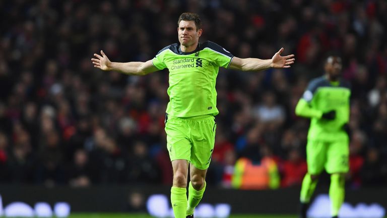 James Milner celebrates after scoring the opening goal