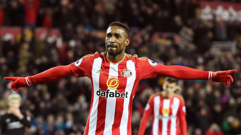 Jermain Defoe celebrates after converting his penalty to level the score at 2-2 against Liverpool