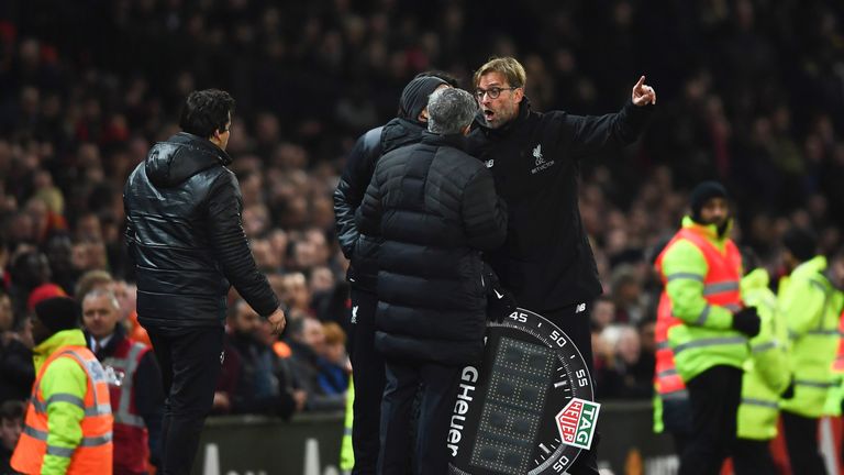 Jose Mourinho and Jurgen Klopp exchange words on the touchline at Old Trafford