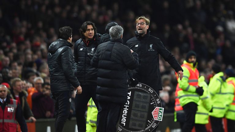 Jose Mourinho and Jurgen Klopp exchange words on the touchline at Old Trafford
