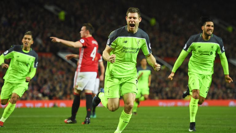 James Milner celebrates after giving Liverpool a 1-0 lead from the penalty spot