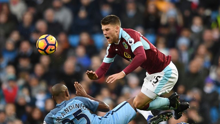 Fernandinho fouls Johann Gudmundsson of Burnley, leading to his red card