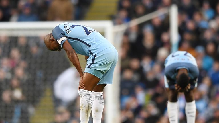 Fernandinho reacts following his dismssal for a challenge on Johann Gudmundsson