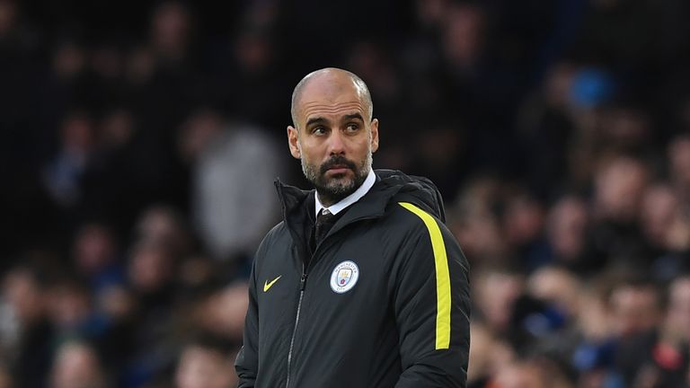 Pep Guardiola looks on during the match against Everton at Goodison Park