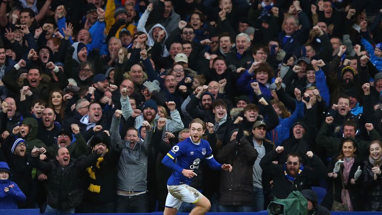 Tom Davies celebrates after scoring Everton's third goal