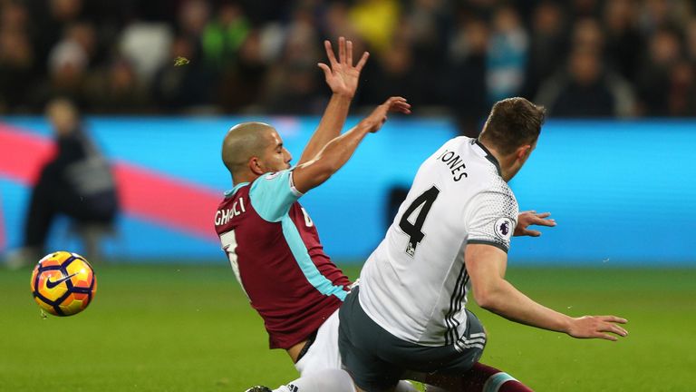 Sofiane Feghouli makes a challenge on Phil Jones resulting in his sending off