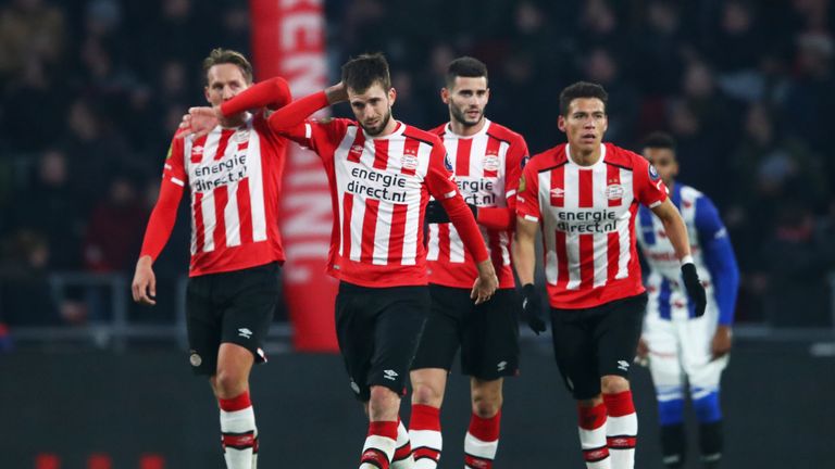 EINDHOVEN, NETHERLANDS - JANUARY 22:  Davy Propper of PSV celebrates scoring his teams first goal of the game with team mates during the Dutch Eredivisie m