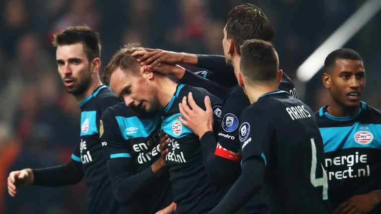 AMSTERDAM, NETHERLANDS - DECEMBER 18:  Siem de Jong of PSV celebrates scoring his teams first goal of the game with team mates during the Eredivisie match 
