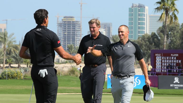 DOHA, QATAR - JANUARY 27:  (L-R) Rafa Cabrera-Bello of Spain,  Ernie Els of South Africa and Alex Noren of Sweden shake hands on the ninth green during the