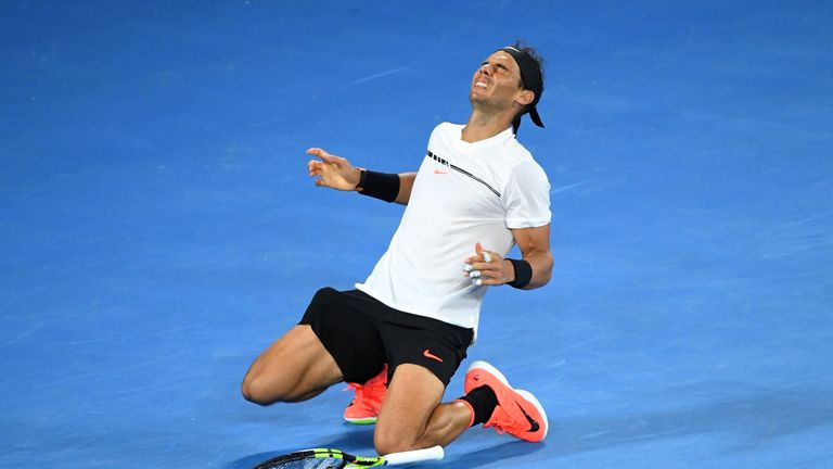MELBOURNE, AUSTRALIA - JANUARY 27:  Rafael Nadal of Spain celebrates winning match point in his semifinal match against Grigor Dimitrov of Bulgaria on day 