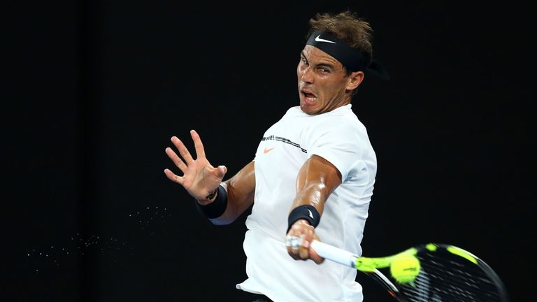 MELBOURNE, AUSTRALIA - JANUARY 23:  Rafael Nadal of Spain plays a forehand in his fourth round match against Gael Monfils of France on day eight of the 201
