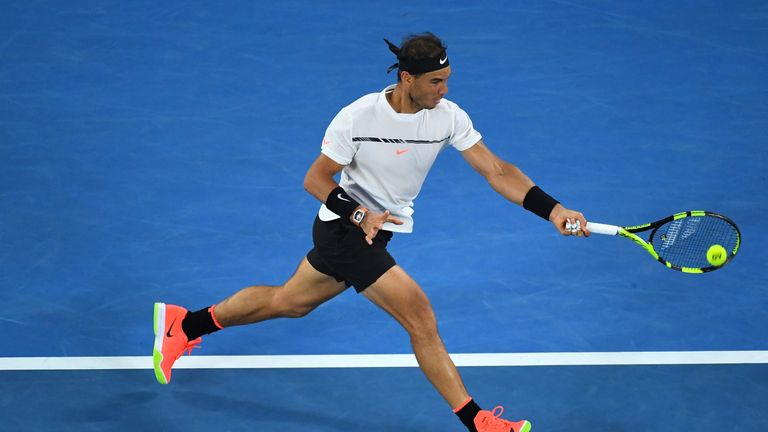 MELBOURNE, AUSTRALIA - JANUARY 29:  Rafael Nadal of Spain plays a forehand in his Men's Final match against Roger Federer of Switzerland on day 14 of the 2