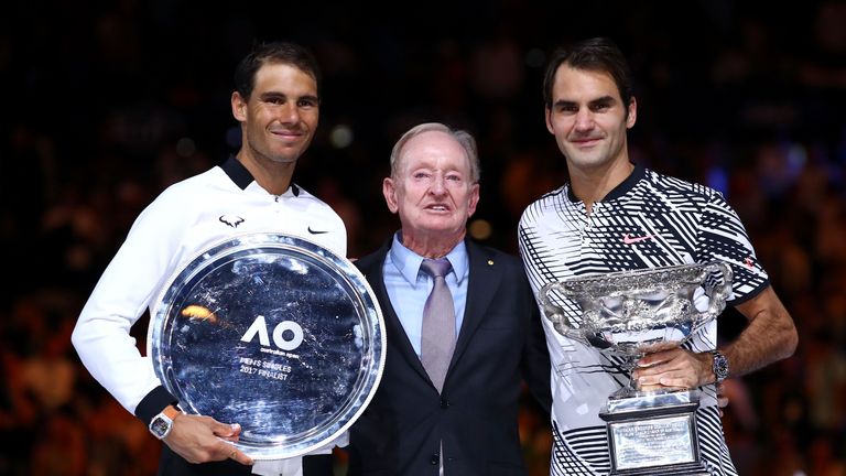 Tennis legend Rod Laver poses with the Australian Open finalists