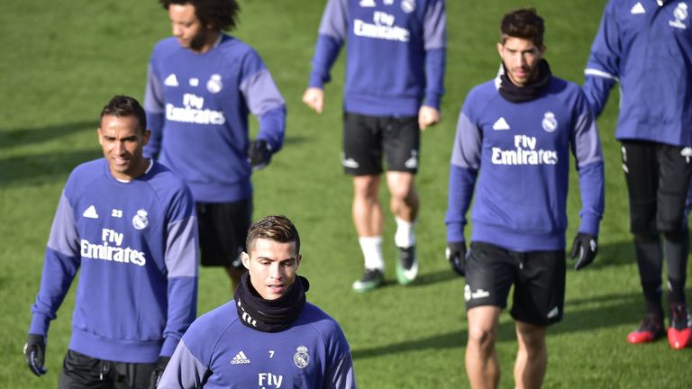 Real Madrid's Brazilian defender Danilo (L) and Cristiano Ronaldo train 