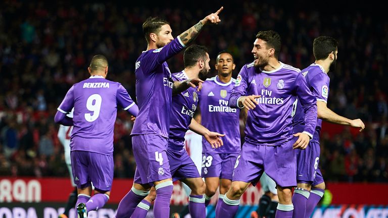 SEVILLE, SPAIN - JANUARY 12:  MSergio Ramos of Real Madrid CF celebrates after scoring the second goal of Real Madrid CF with his team mates during the Cop