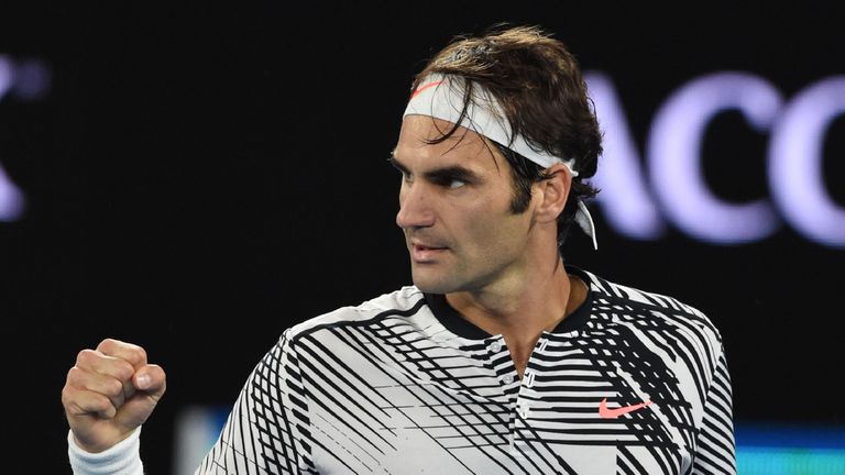 Switzerland's Roger Federer reacts after a point against Spain's Rafael Nadal during their men's singles final match on day 14 of the Australian Open tenni