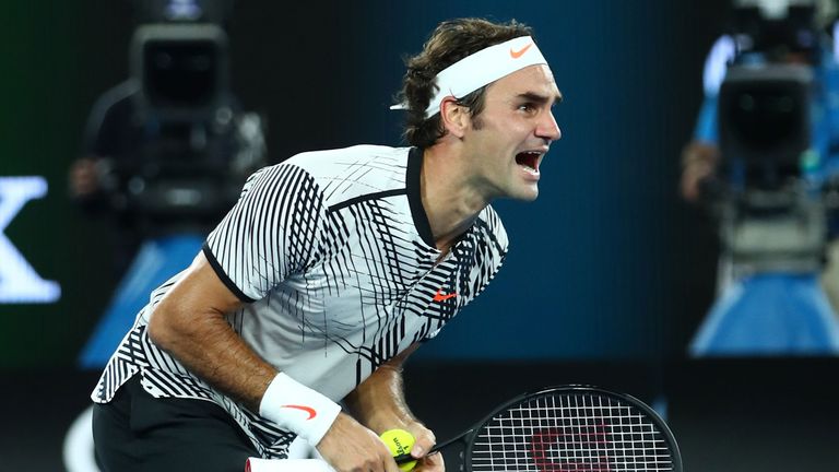 Federer celebrates after seeing off Nadal to win his 18th Grand Slam title