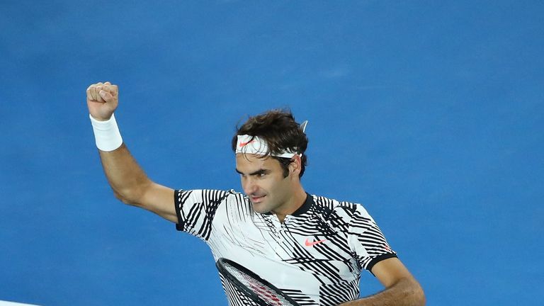 MELBOURNE, AUSTRALIA - JANUARY 26:  Roger Federer of Switzerland celebrates winning match point in his semifinal match against Stan Wawrinka of Switzerland
