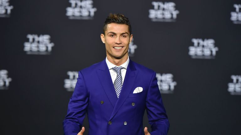 Real Madrid and Portugal's forward Cristiano Ronaldo poses as he arrives for The Best FIFA Football Awards 2016 ceremony, on January 9, 2017 in Zurich. / A