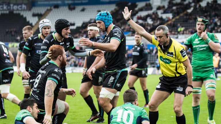 Dan Baker (No 8) is congratulated after scoring the Ospreys' first try against Connacht