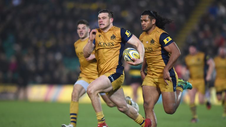 Jason Woodward runs in to score a try against Northampton