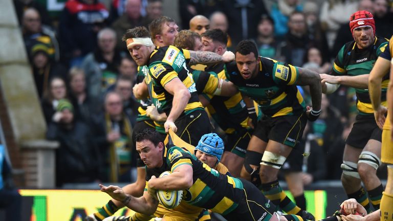 Louis Picamoles of Northampton Saints dives over the line to score their first try