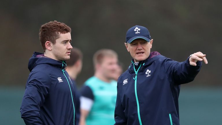 Ireland head coach Joe Schmidt talks to Paddy Jackson during training