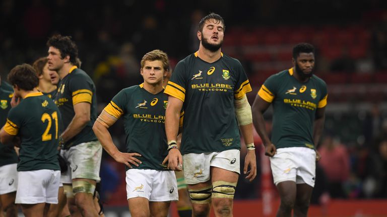 Lood de Jager (second from right) reacts after their loss to Wales in November 2016