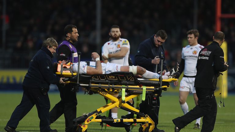Geoff Parling of Exeter Chiefs is stretchered off the pitch 
