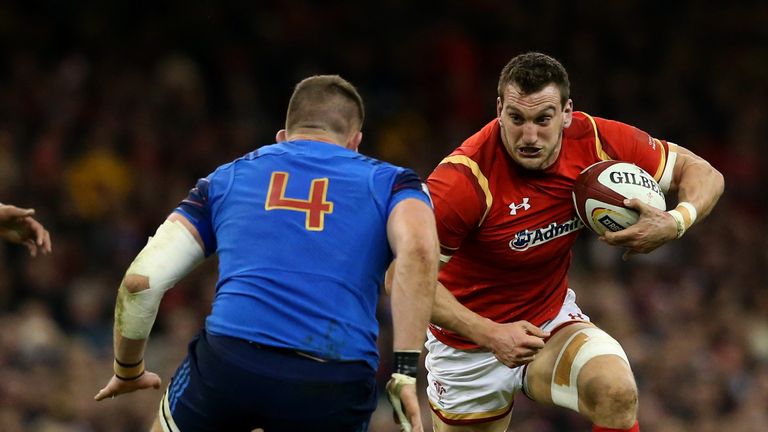 CARDIFF, WALES - FEBRUARY 26:  Sam Warburton of Wales charges towards Paul Jedrasiak of France during the RBS Six Nations match between Wales and France at