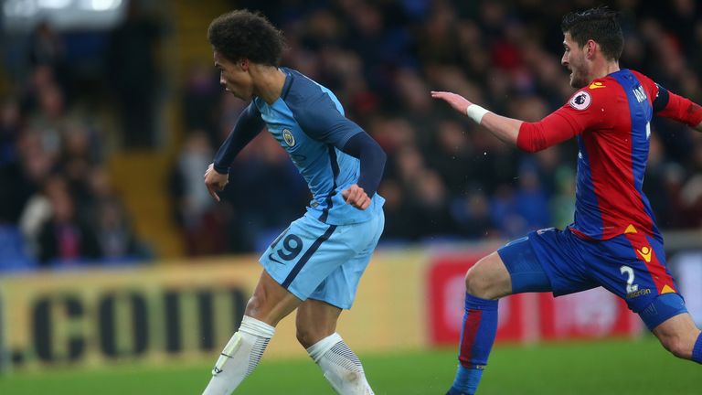 Leroy Sane slots home Man City's second goal against Crystal Palace