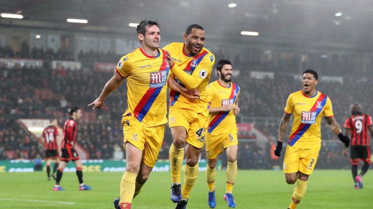 Crystal Palace's Scott Dann (left) celebrates scoring his side's first goal during the Premier League match at the Vitality Stadium, Bournemouth.
