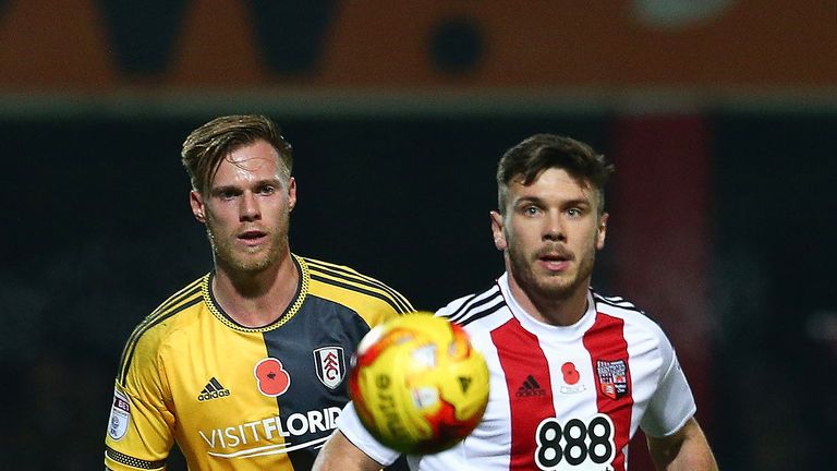 Tom Kalas and Scott Hogan in action during the Sky Bet Championship match between Brentford and Fulham