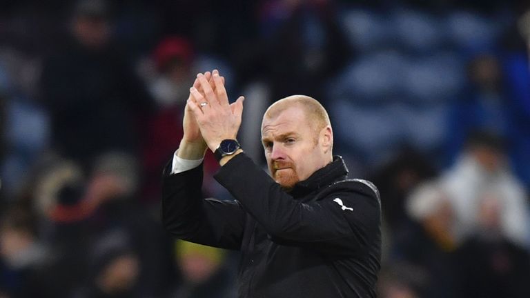 Burnley's English manager Sean Dyche applauds at the end of the English FA Cup fourth round football match between Burnley and Bristol City at Turf Moor in