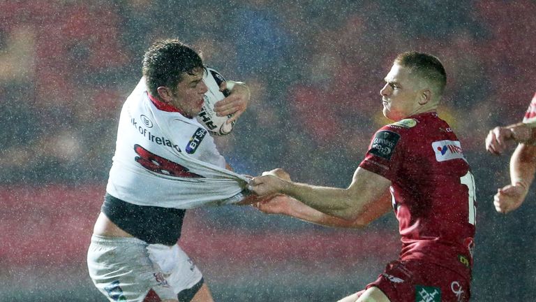 Guinness PRO12, Parc y Scarlets, Llanelli, Wales 6/1/2017.Scarlets vs Ulster.Ulster's Sean Reidy is tackled by Johnny McNicholl of Scarlets.