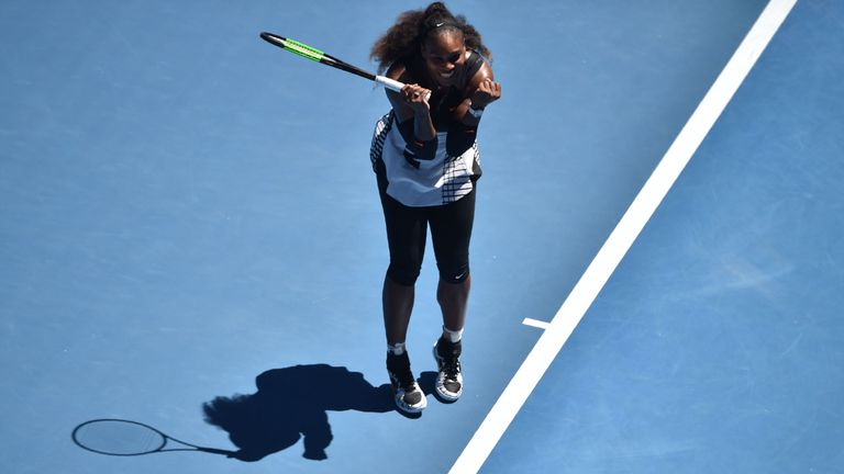 Serena Williams of the US celebrates her victory against Britain's Johanna Konta in their women's singles quarter-final match on day ten of the Australian 