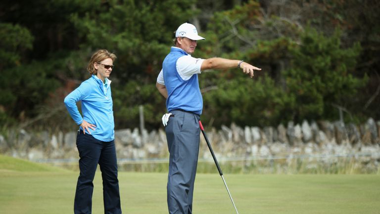 Sherylle Calder working with Ernie Els
