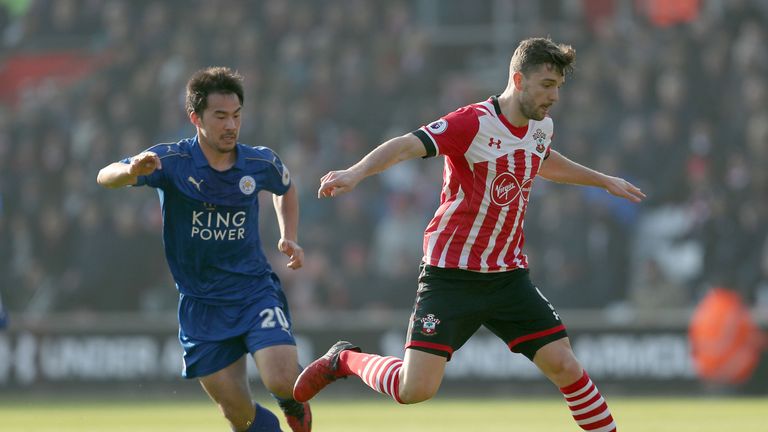 Shinji Okazaki keeps track of Jay Rodriguez 