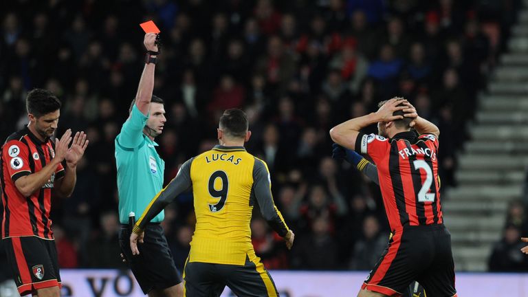 Bournemouth captain Simon Francis is sent off by Michael Oliver in the game against Arsenal