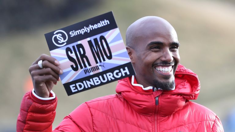 Sir Mo Farah poses for photographs in Holyrood Park prior to Saturday's Great Edinburgh X Country