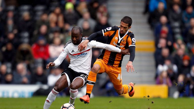 Sone Aluko tries to get away from Evandro 