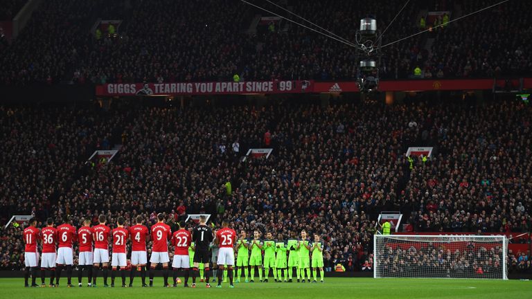 During a pre-match tribute to former England manager Graham Taylor, Spidercam hangs over the Old Trafford pitch - its first use in a Premier League game