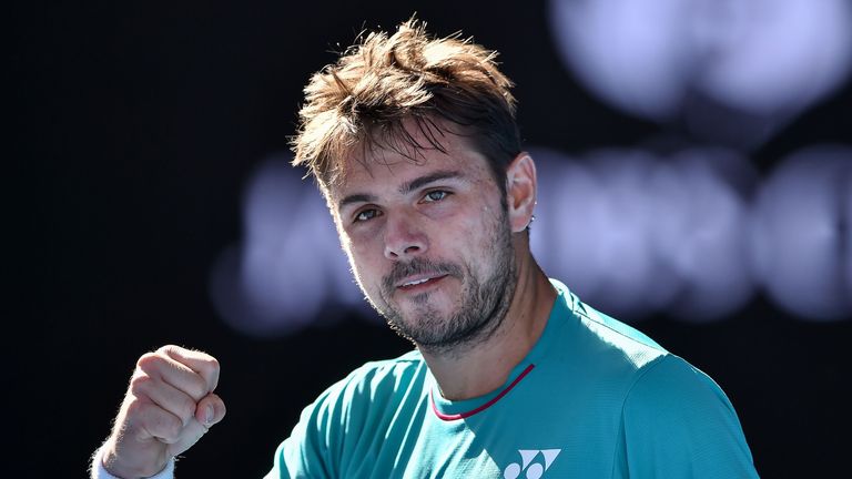 Stan Wawrinka celebrates his victory against Jo-Wilfried Tsonga during their quarter-final match at the Australian Open 