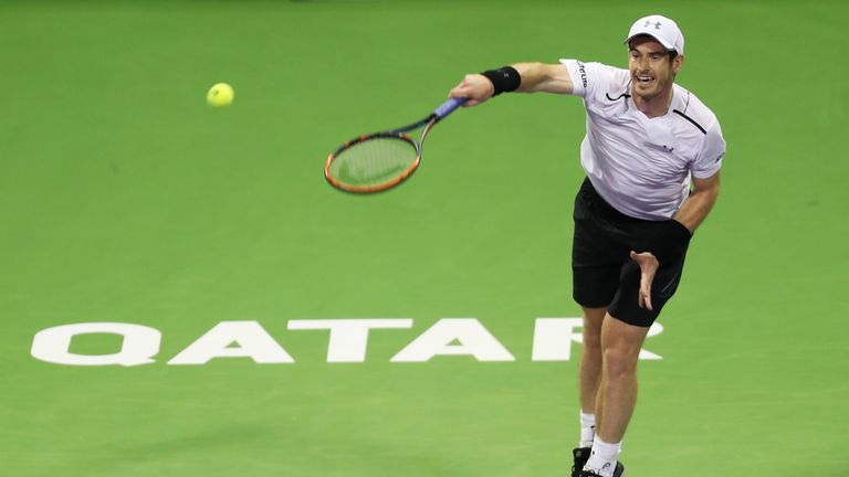 British player Andy Murray serves the ball to France's Jeremy Chardy on the fourth day of the ATP Qatar Open