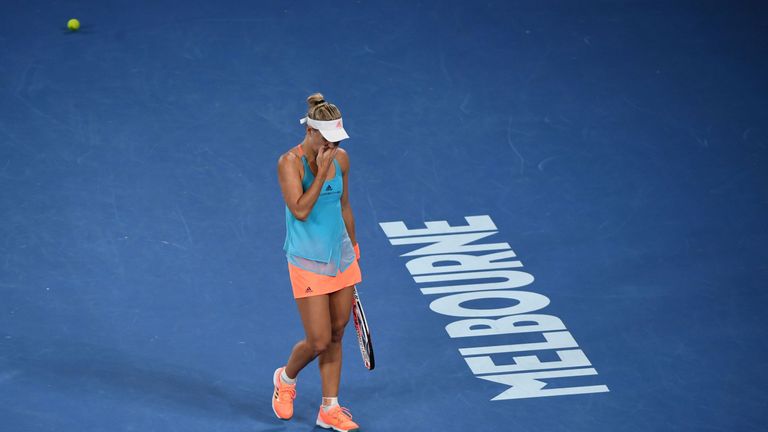 Angelique Kerber reacts while playing against Coco Vandeweghe during their women's singles fourth round match on day seven of the Australian Open