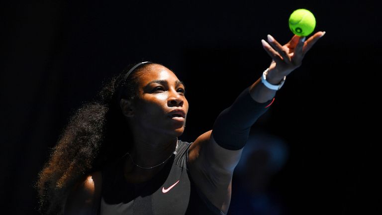 Serena Williams serves in her quarter final match against Johanna Konta