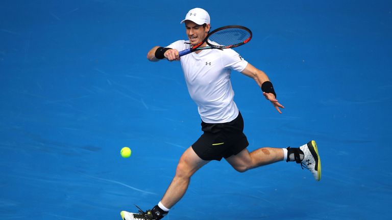Andy Murray of Great Britain plays a forehand in his third round match against Sam Querrey of the United States
