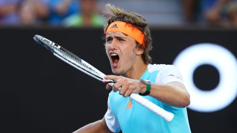 Alexander Zverev celebrates winning the third set in his third round match against Rafael Nadal