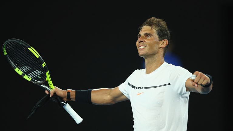 Rafael Nadal celebrates to the crowd after victory in his second round match against Marcos Baghdatis