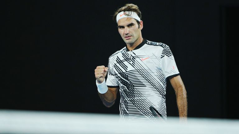 Roger Federer celebrates a point in his fourth round match against Kei Nishikori